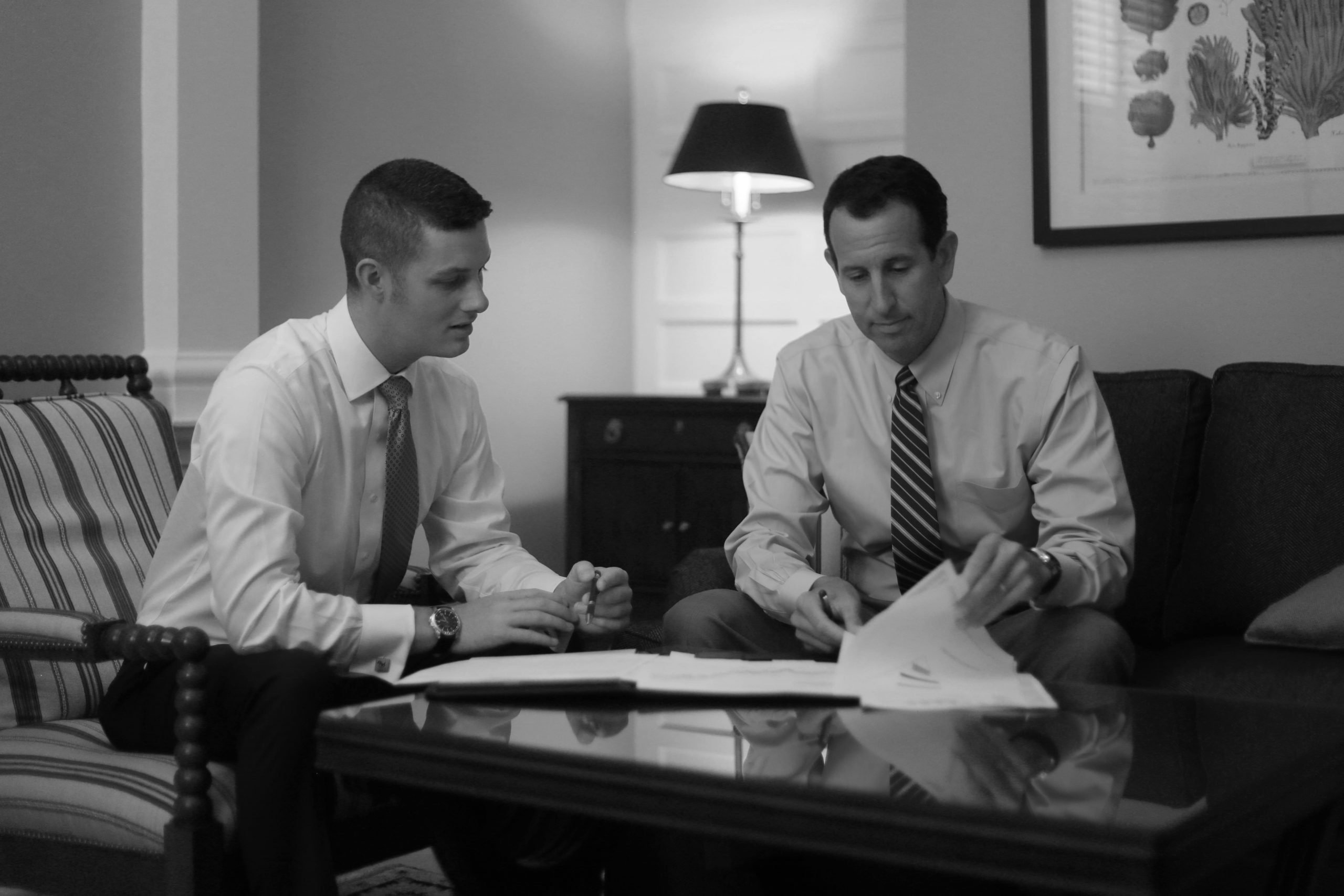 Two Financial Advisors Discussing Investments