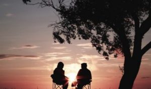 retirement couple enjoying sunset