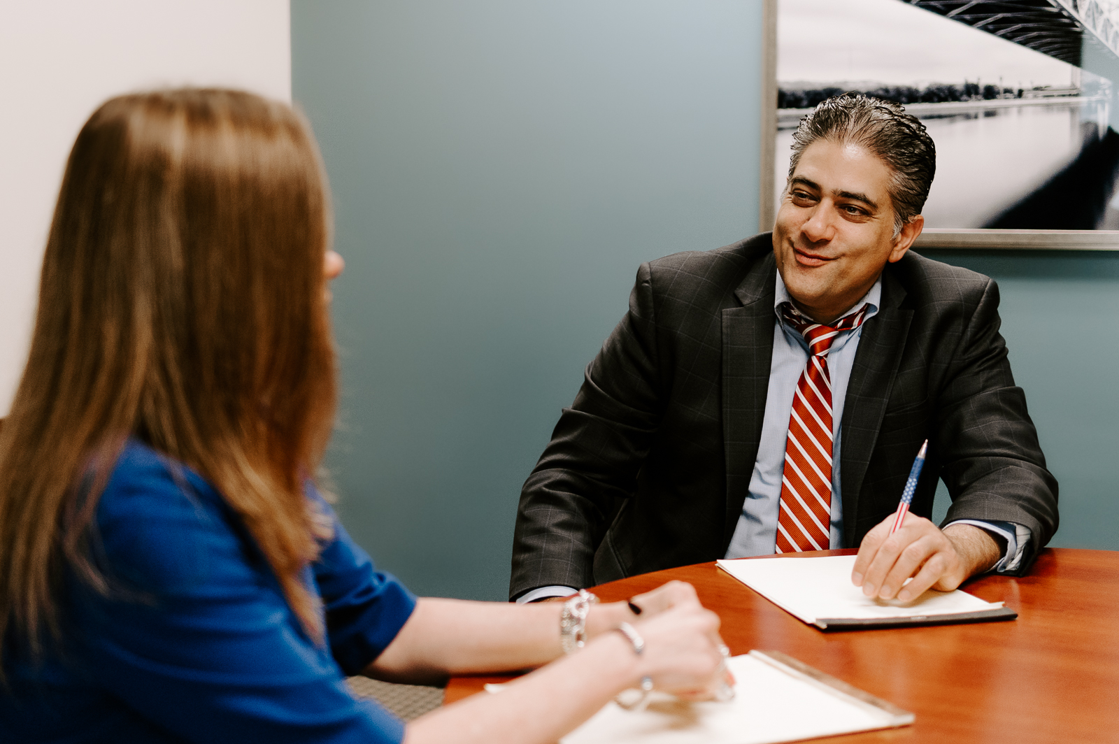 Advisor meeting with client relationship specialist